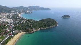 Aerial view of Karon and Kata Beach, Andaman sea in Phuket, Thailand. Beautiful tropical coastal landscape from top view. Summer holiday vacation concept. 4K drone video
