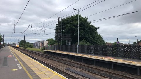 Northallerton, North Yorkshire, England, United Kingdom - August 17, 2021: LNER Azuma high speed passenger train heading south