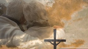Animation of cross and sunset over back view of embracing senior couple. religion, faith and christianity concept digitally generated video.