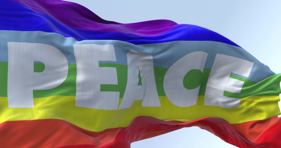 the rainbow flag of peace flying in the wind. No war movement. Seamless loop in slow motion Royalty-Free Stock Footage #1087593917