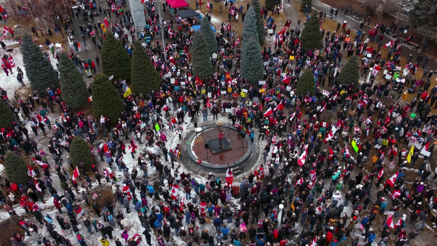 Crowd with speaker pull out wide shot Calgary Protest 12th Feb 2022