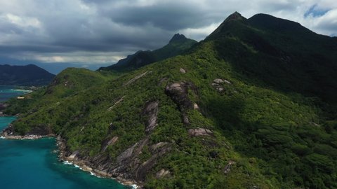Drone footage flying over Anse Major on Mahe Island in the Seychelles.