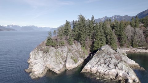 Aerial natural seascape in Whytecliff Park West Vancouver, drone view of Canada mountains landscape with off grid houses on the coastline woodland