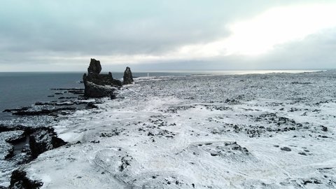 The landscape is full of lava rocks, with no indication of life. Beautiful scenery in Iceland.