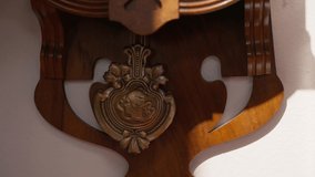 Slow motion of wall clock pendulum - Powered by Shutterstock - Get 15% off with code: PIKWIZARD15