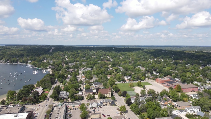 Panoramic Aerial View of Geneva Lake, Wisconsin USA, Resort Town and Riviera on Sunny Day, Drone Shot