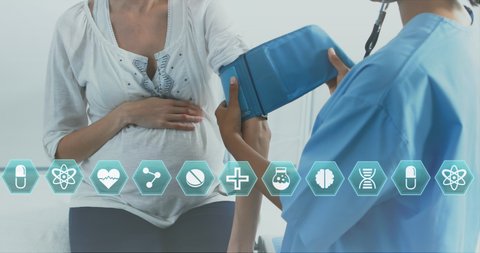 Animation of medical icons over pregnant caucasian woman having blood pressure checked by midwife. international day of the midwife and pregnancy concept digitally generated video.