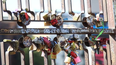 BERLIN, GERMANY - Aug 2014 : Berlin Wall. hole on a wall, memory where people put padlocks for luck and love. Berlin, Germany