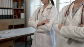 4K 25fps Slow Motion, Two female doctors from different hospitals raised their thumbs, to congratulate, excellent, to the medical students who studied well in the hospital. health and medical concepts - Powered by Shutterstock - Get 15% off with code: PIKWIZARD15