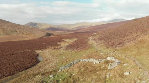 Lake District. Cumbria. March. 22. 2022. England. Flying over moorland drone footage
