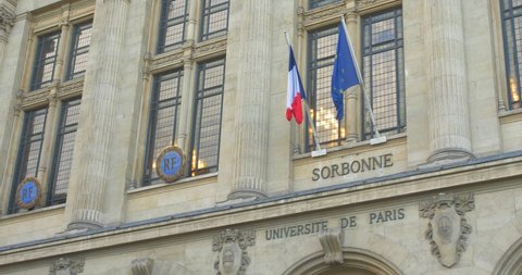 Paris , France - 02 14 2022: Sorbonne University Building's Flags At Primary Entrance On The Rue Des Ecoles