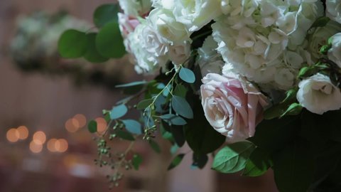 Bouquet of flowers close-up, room decoration, flower decor, wedding hall, beautiful bokeh