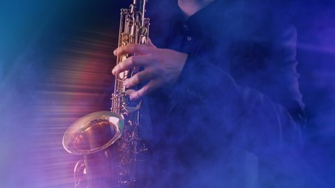 Energetic Saxophone Player In Party Lights And Smoke