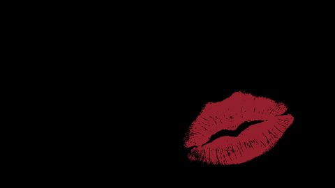 The imprint of the kiss appears on a transparent background. Lip print with red lipstick.