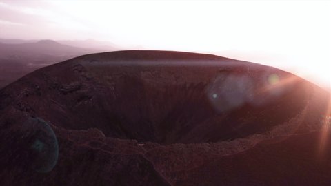 Volcano crater aerial shot at sunset - Canary Islands - Fuerteventura
