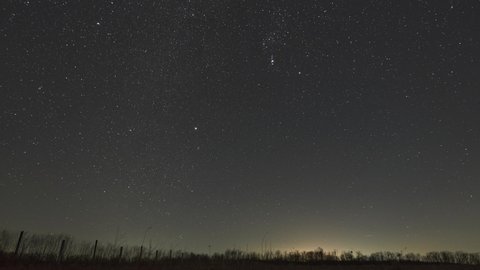Timelapse with Milky Way, Orion and other constellations in the winter seen in Northern hemisphere