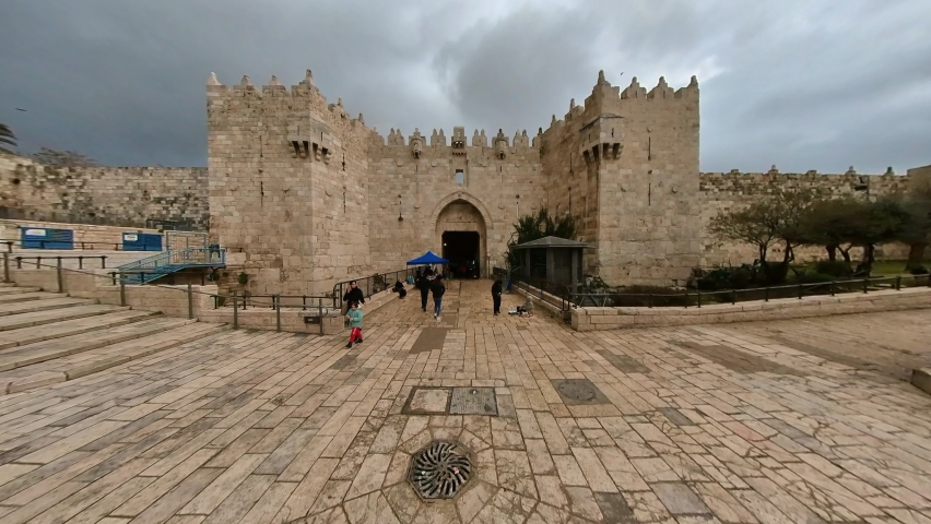 Entering the Muslim Quarter in Old City Jerusalem via Damascus gate. Market, bazaar, stores, commerce, suq. Jerusalem Israel February 6, 2022