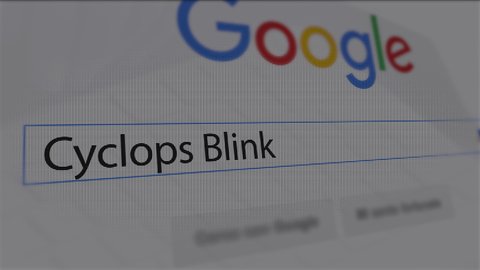 USA-Popular searches in 2022 Google Search Engine - Search For Cyclops Blink - Monitor with reflection hands typing a search on google