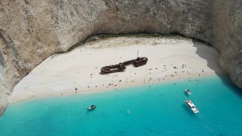 Aerial view of navagio crystal water shipwreck beach in Zakynthos, Greece, during summer