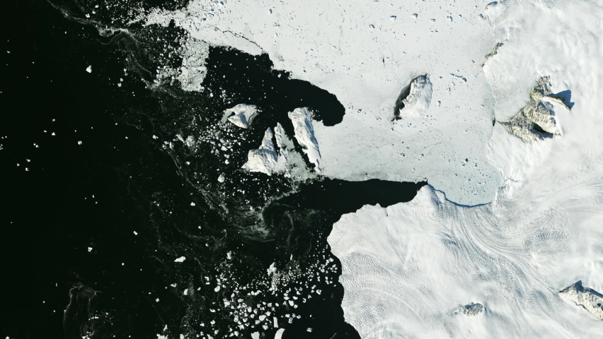 Melting glaciers time-lapse, frozen Baffin Bay aerial satellite view from space. Royalty-Free Stock Footage #1087708529