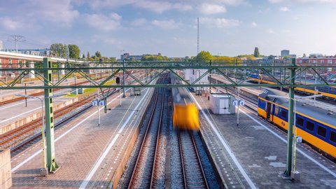 The Hague Netherlands - 10 19 2021: Day Time Lapse of arrival and departure trains in den haag, Zuid-Holland, The Netherlands