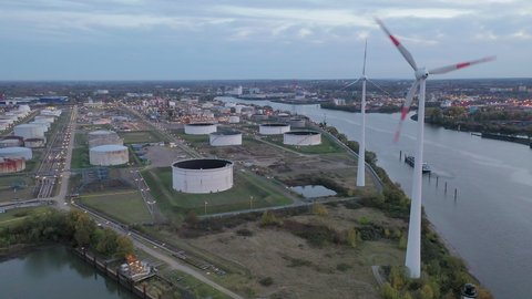 wind turbines and oil tanks in the port of Hamburg