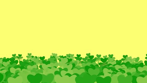 St. Patrick's animated clovers against a yellow background. For use as a general backdrop, design element or as an overlay for placement of text or other copy.
