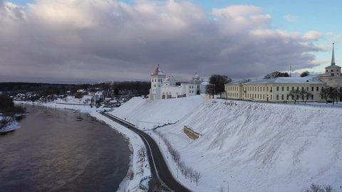 Grodno, Belarus-January 2022: a beautiful white old castle high on the castle hill above the river at sunset in late autumn. Aerial photography