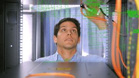 Animation of data processing over biracial man in server room. global data processing, computing and digital interface concept digitally generated video. - Powered by Shutterstock - Get 15% off with code: PIKWIZARD15