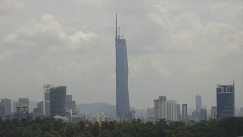 "Kuala Lumpur, Malaysia- Circa February, 2022: A noise effect timelapse footage of haze and foggy Kuala Lumpur with iconic PNB 118 tower insight."