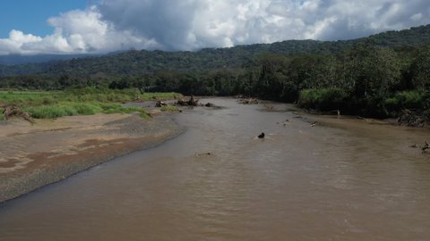 Tarcoles river full of crocodiles Costa Rica aerial shot muddy water natural predators