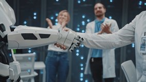 Future data center. In server room robot and businessman shaking hands for collaboration. Interaction. Telecommunications. High tech. Technology. - Powered by Shutterstock - Get 15% off with code: PIKWIZARD15