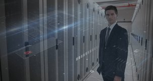 Animation of cyber attack warning and padlock over caucasian man in server room. global internet security, connections and data processing concept digitally generated video.