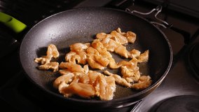 Frying Chicken on a Frying Pan, Stirring with Wooden Spoon, Japanese food - Powered by Shutterstock - Get 15% off with code: PIKWIZARD15