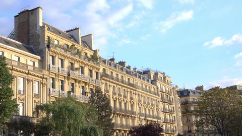 Paris, France - May 2019 : Facade of typical Parisian Haussmannian buildings on the Avenue Foch in Paris, France