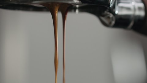 closeup of espresso extraction with bottomless portafilter