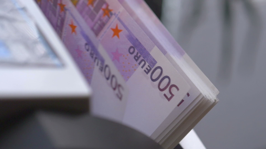 Machine counter automatic calculates a large amount of Euro banknotes in Slow motion 180fps Royalty-Free Stock Footage #1087801249