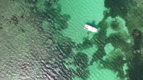 boats jachts on water sea Drone view Coastline Diani beach landscape Kenyan African Sea  aerial 4k waves blue indan ocean tropical mombasa turquoise white sand East Africa palms paradise wit coral