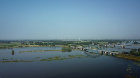 High water level on the floodplains of the river IJssel near the city of Zwolle in Overijssel, The Netherlands. Aerial drone point of view.