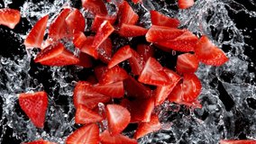Super slow motion of rotating strawberries with splash water, black background. Filmed on high speed cinema camera, 1000 fps. - Powered by Shutterstock - Get 15% off with code: PIKWIZARD15