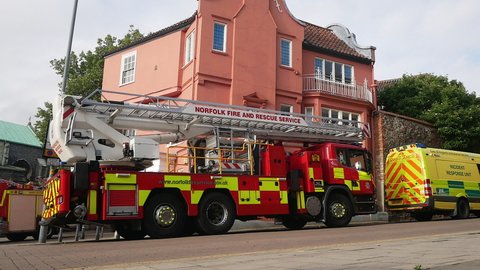 Norwich, Norfolk, United Kingdom. July 28, 2020. Fire and ambulance vehicles at St Andrews Plain Norwich whilst a man was in danger on top of a multi-storey car park. The man died later after falling.