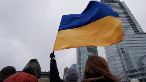 DOWNTOWN VANCOUVER, BC, CANADA - FEB 26, 2022: Protest rally against Vladimir Putin and the Russian invasion of Ukraine that was attended by thousands in Downtown Vancouver. 4K 24FPS