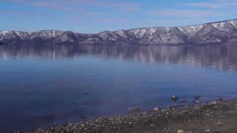 Footage of calm water in the winter at Lake Kussharo, Hokkaido, Japan