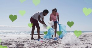 Animation of green hearts over african american couple with recycling bags cleaning beach. environment and sustainability concept digitally generated video.