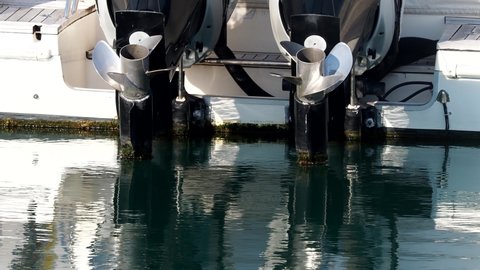 outboard motor propeller in a harbour