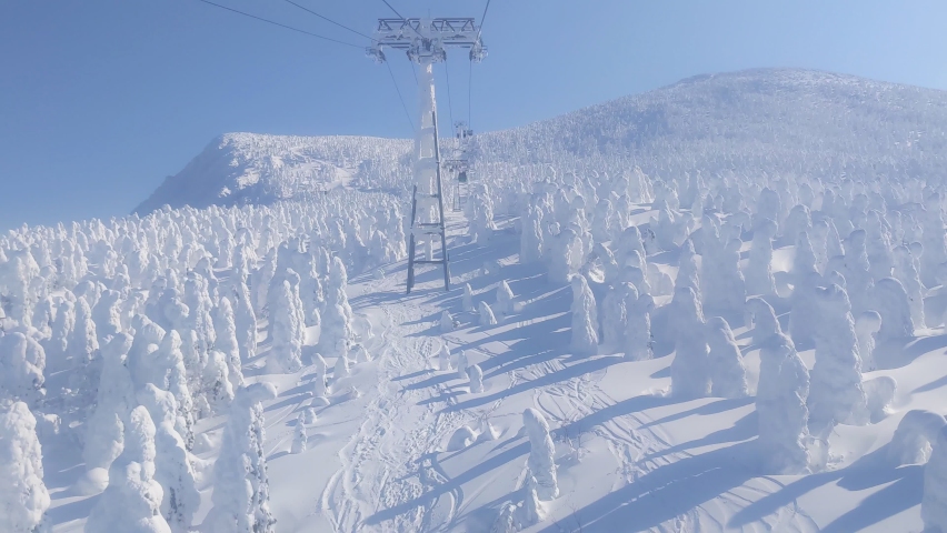 Passing through ice monsters (soft rime) plateau with cable car. (Zao, Yamagata, Japan) Royalty-Free Stock Footage #1087845971