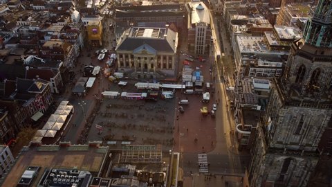 GRONINGEN, NETHERLANDS - 27. FEBRUARY 2022: Aerial timelapse of Grote markt and Martinitoren at sunset. Depicts the heart of Groningen city.
