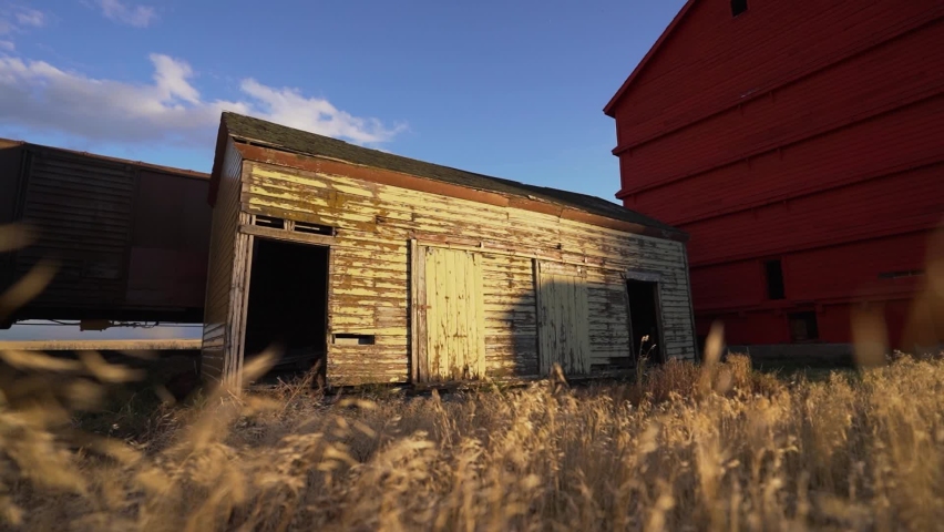 Beautiful shot of ancient rustic cabin in a farm. House made of wooden logs.