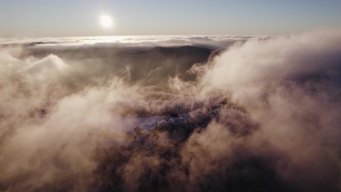 Sunrise drone footage of frosted trees high up in the Appalachian mountains of North Carolina.