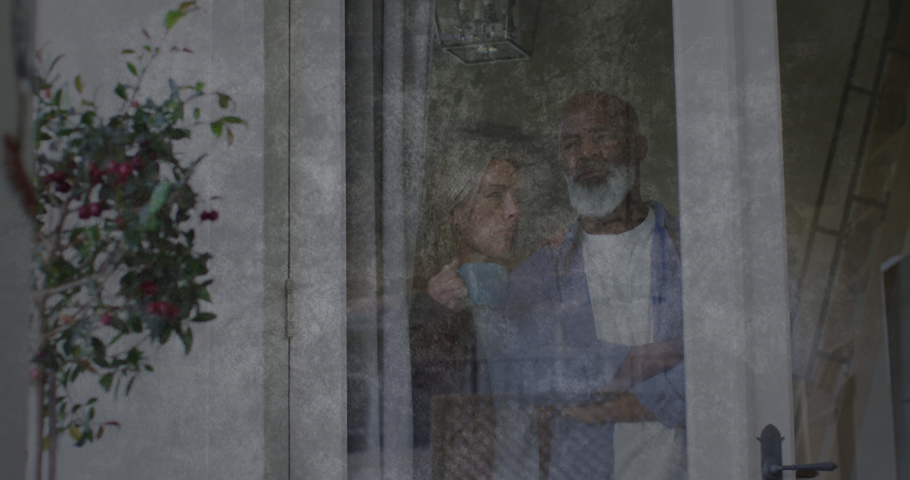 Animation of moving background over sad senior diverse couple embracing. mental health awareness week and celebration concept digitally generated video.